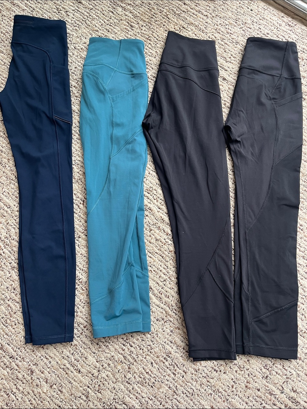 4 pairs of Lululemon athletica leggings in light green, navy, and black size 6